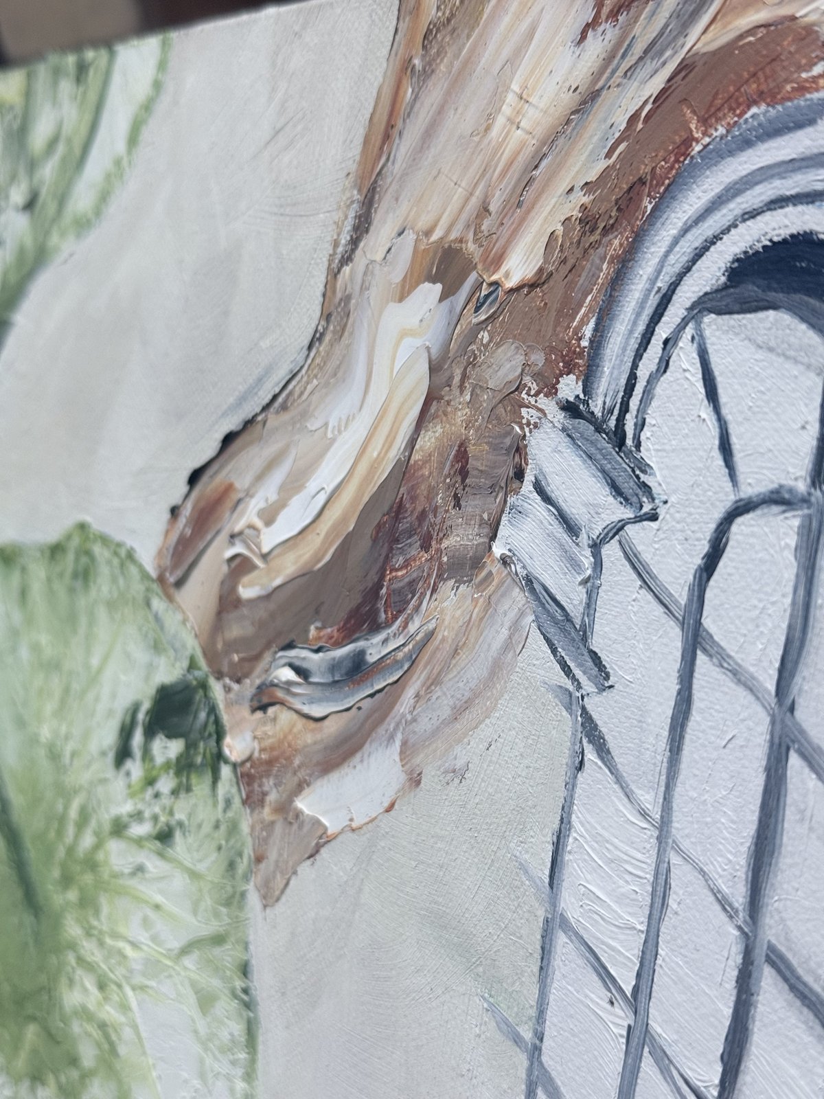 Close-up of the driftwood meeting the arched window